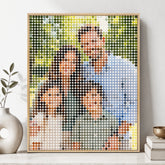 Personalized Mosaic Dots wall art created from a family photo and displayed in a natural wood frame.