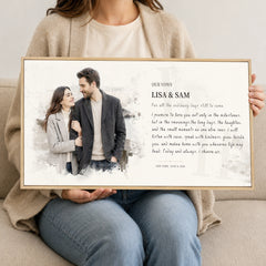 Woman holding a custom couple watercolor-style vows portrait in a natural walnut frame to show its scale.