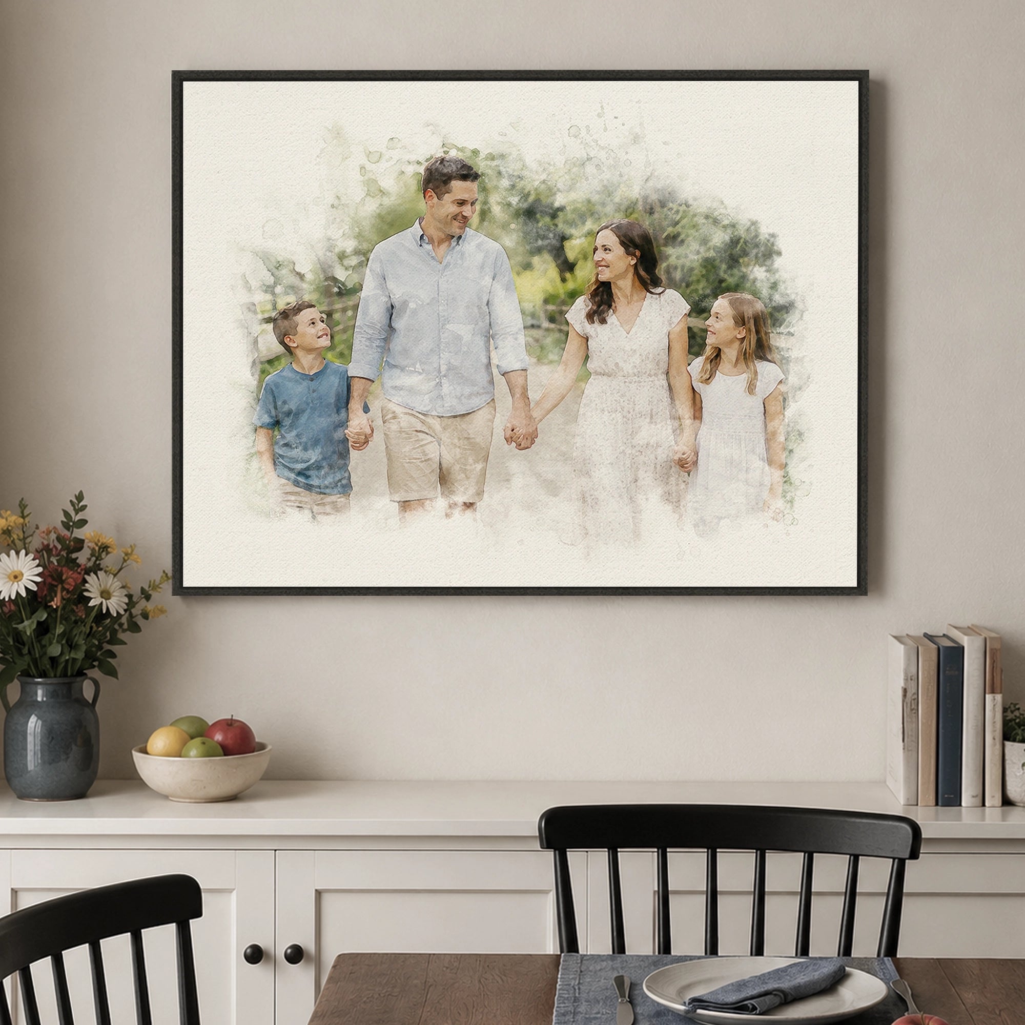 Horizontal custom family watercolor portrait from a photo in a black walnut frame displayed in a dining room.
