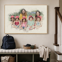 Custom group watercolor portrait of two adults and five children in a natural walnut frame above an entryway bench.