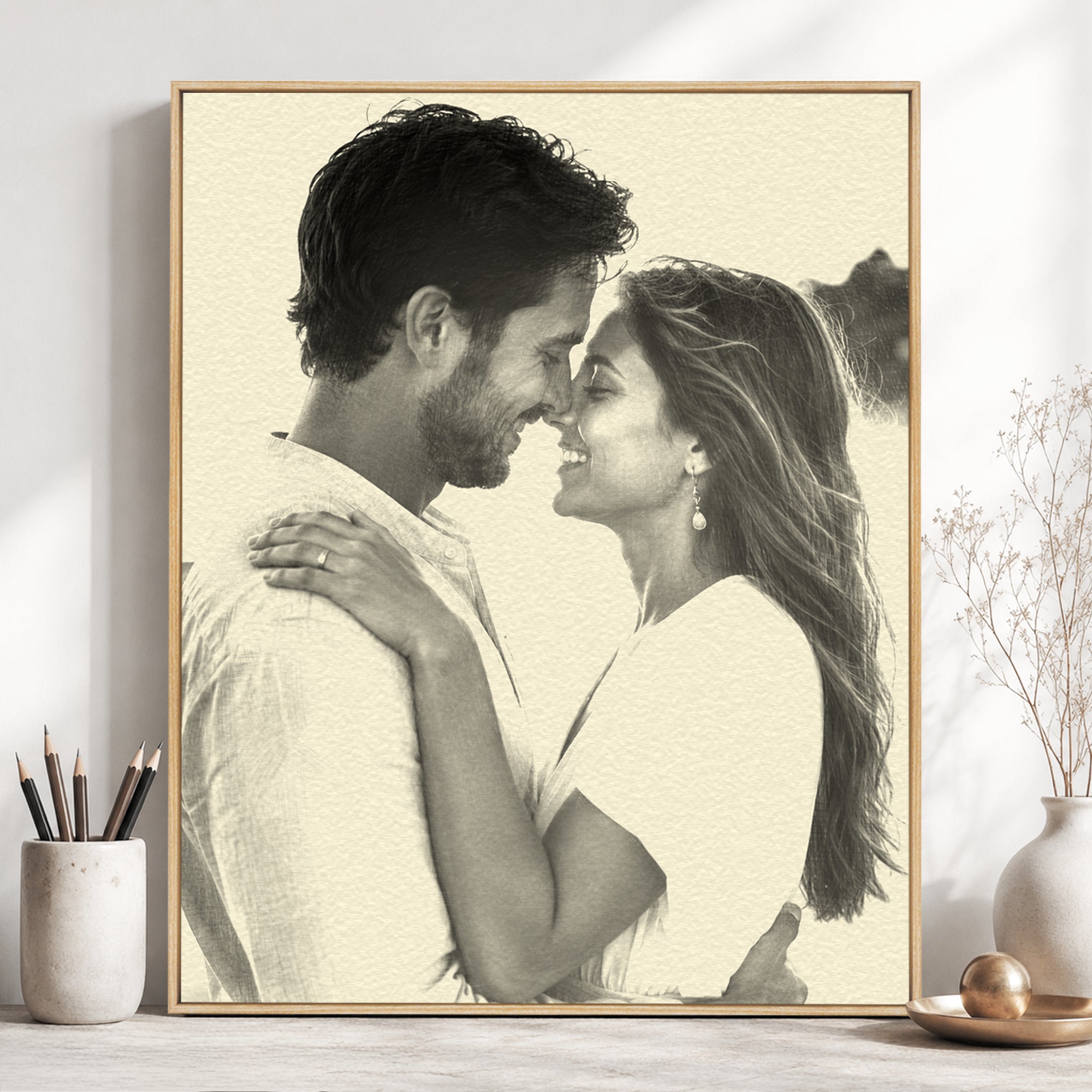 Personalized pencil-style portrait of a couple displayed as framed custom wall art.